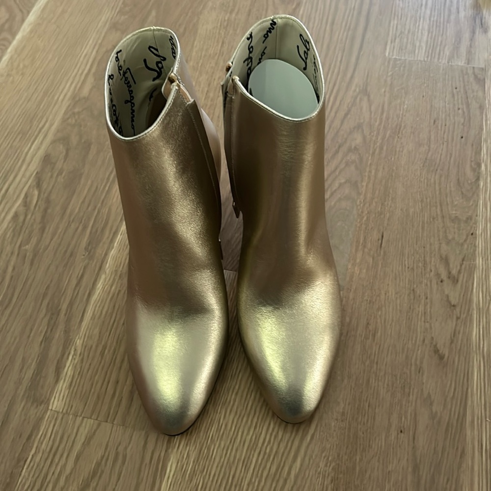 Gold Ferragamo booties. Brand new.